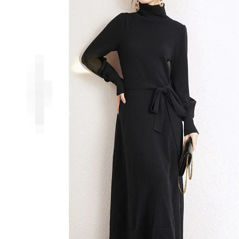 Turtleneck knitwear dress in polyester fabric with elastic waist and loose hem in solid colour