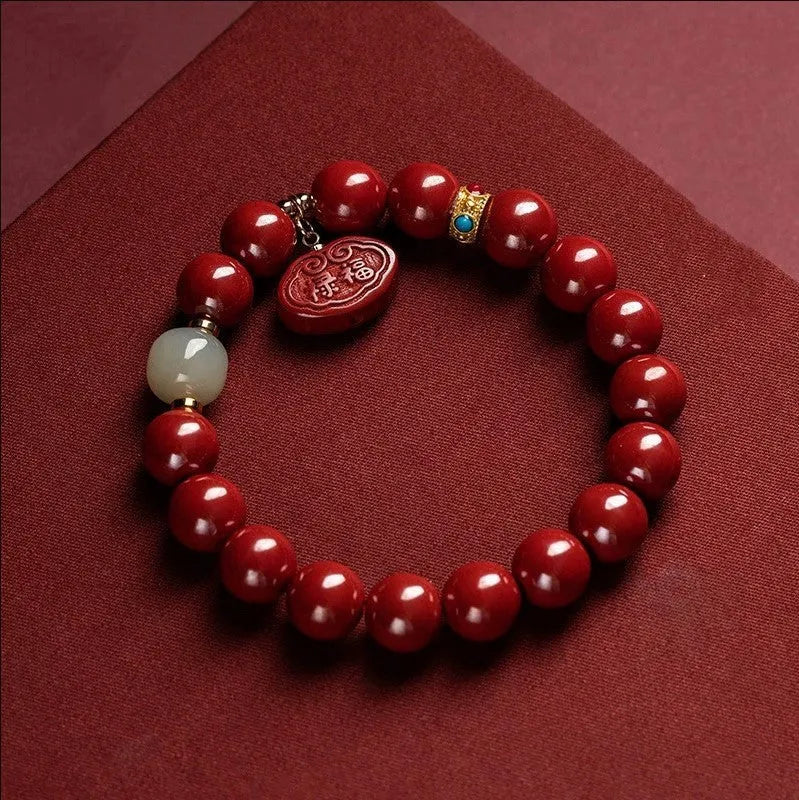 Natural cinnabar Emperor Sandstone Ping An Fu Lu bracelet in 8mm or 10mm bead size.