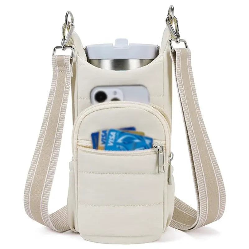 Cloth cycling water bottle bag in beige colour positioned on bicycle frame