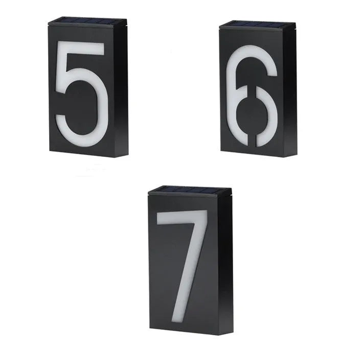 Solar powered house number light with white LEDs illuminating digit, IP65 waterproof outdoor design