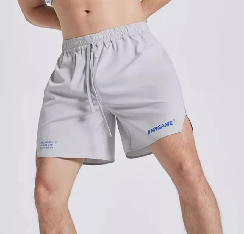 Men's training shorts in polyester spandex blend available in four colours