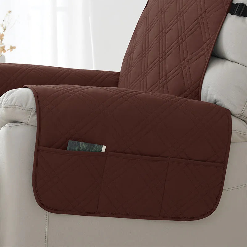 Quilted waterproof sofa cover on a Chivas massage chair in peacock blue colour.