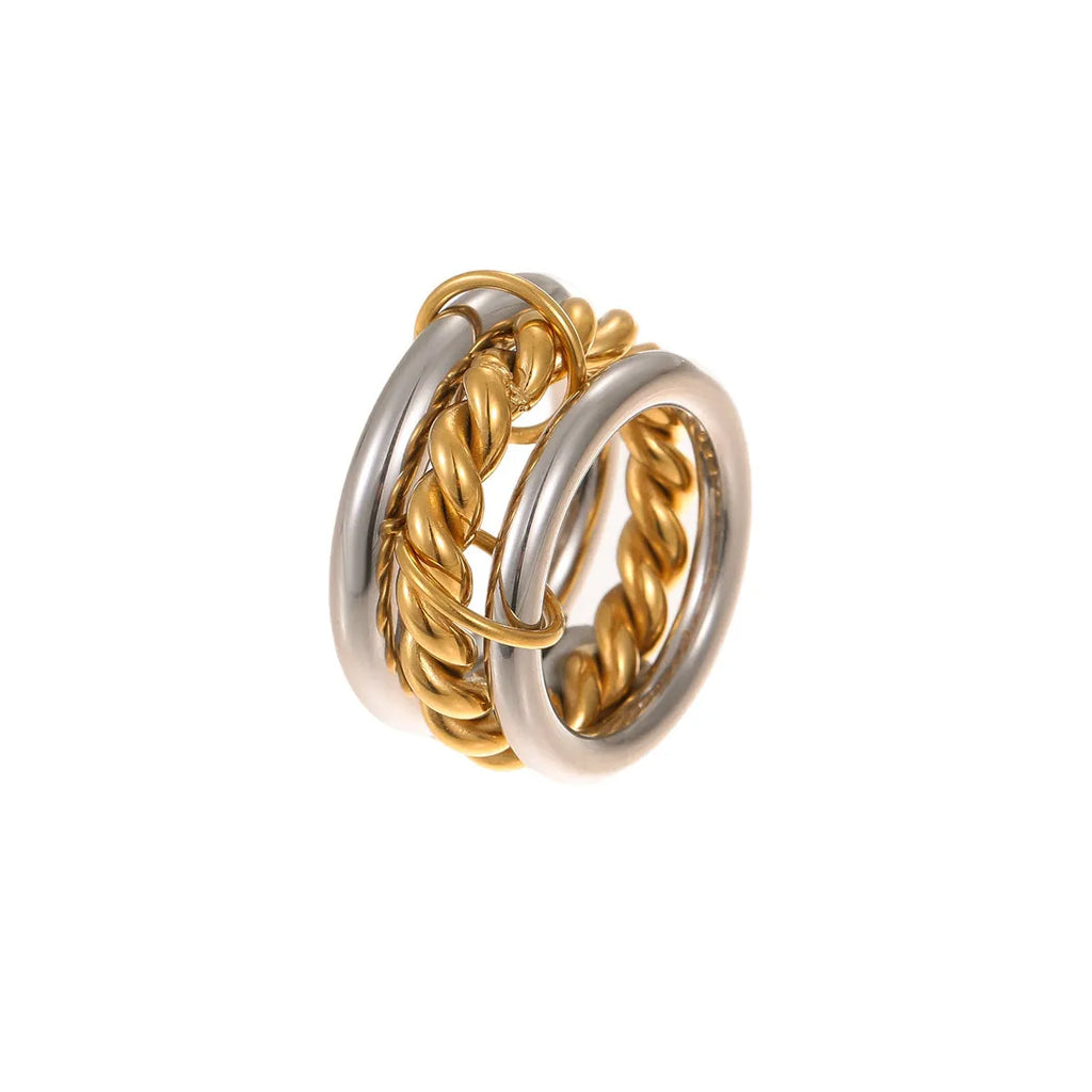 Gold plated exaggerated stackable ring for women on a hand, showing layered jewellery style.