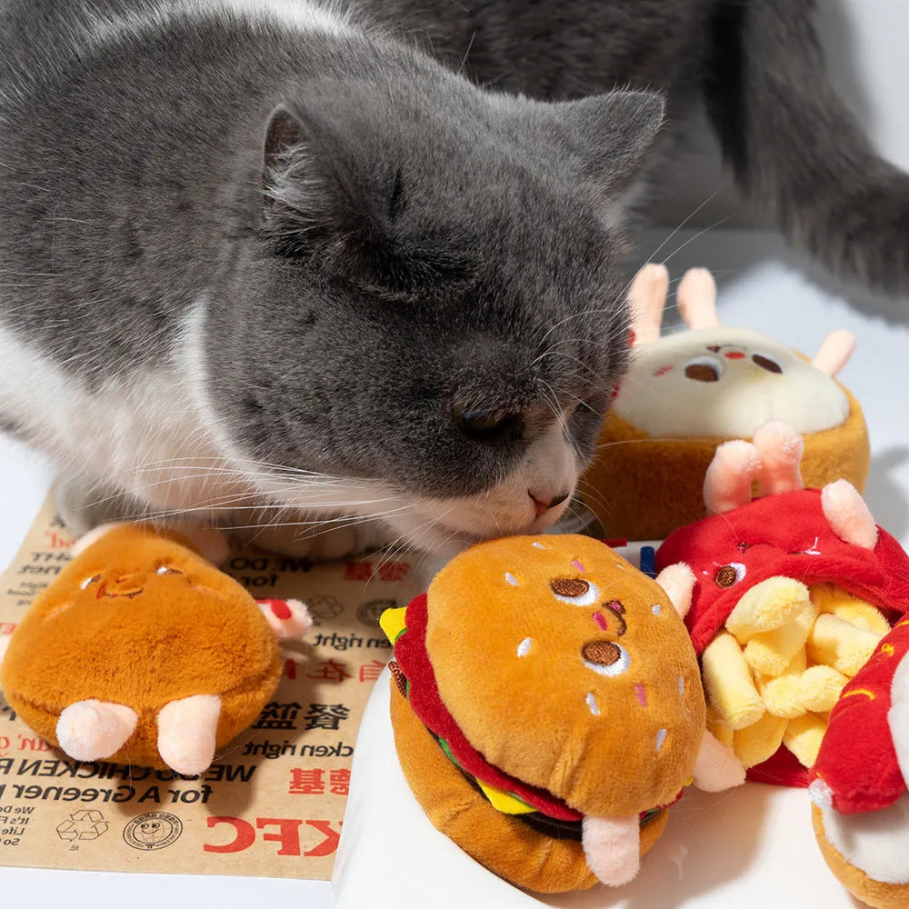 Set of five soft cat toys shaped like hamburger, chicken leg, fries, bread, and hot dog on a white background