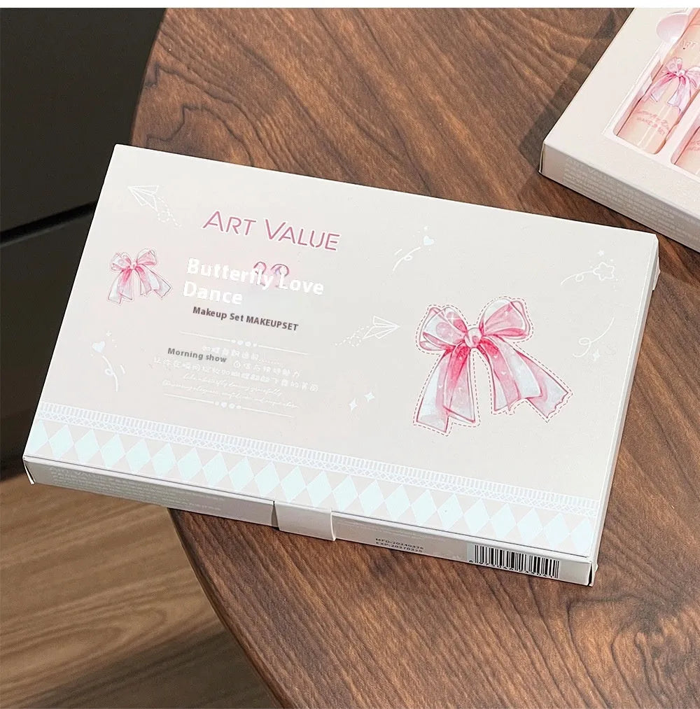 Butterfly Box makeup set showing four lip muds, powder blusher and matching necklace