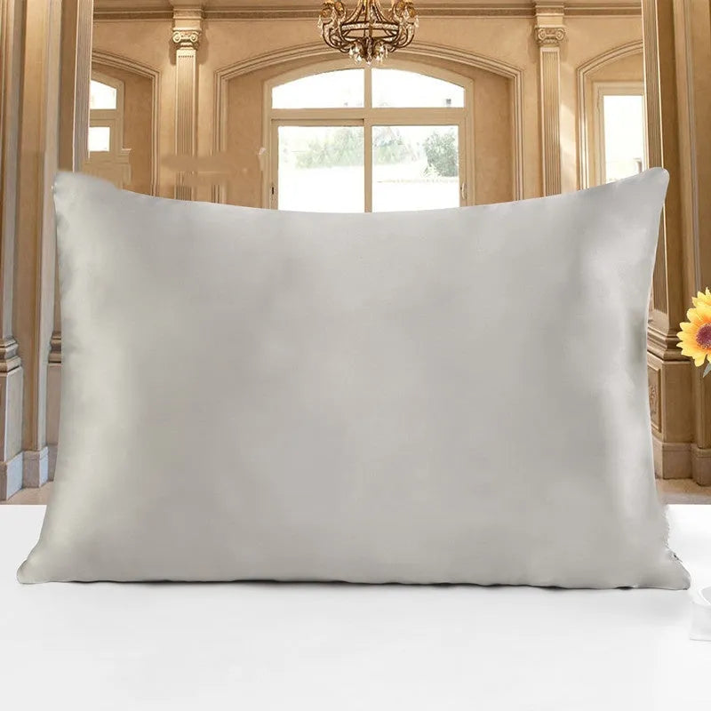Double-sided 19 M silk pillowcase in apricot colour, showing reversible construction and standard UK size.