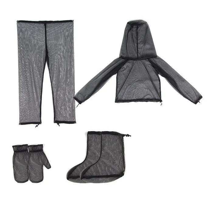 Adult wearing a light grey mesh anti-mosquito suit with hood, full-length pants, and booties for outdoor protection.