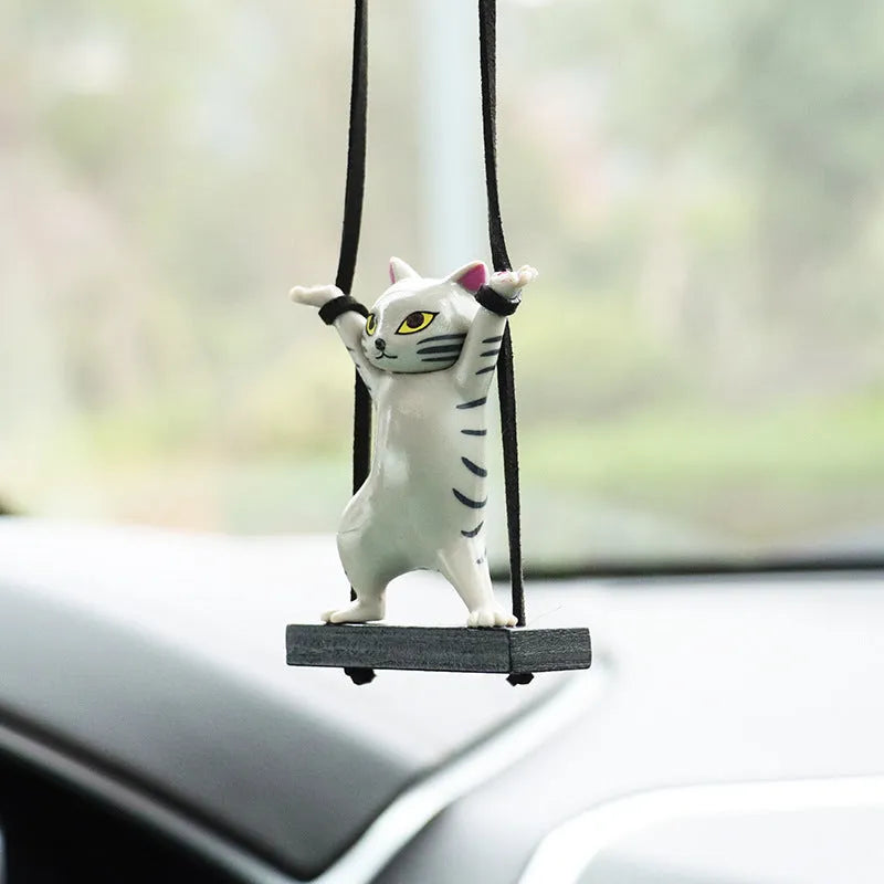 Resin cartoon cat pendant for car interior decoration on a 25 cm adjustable rope.