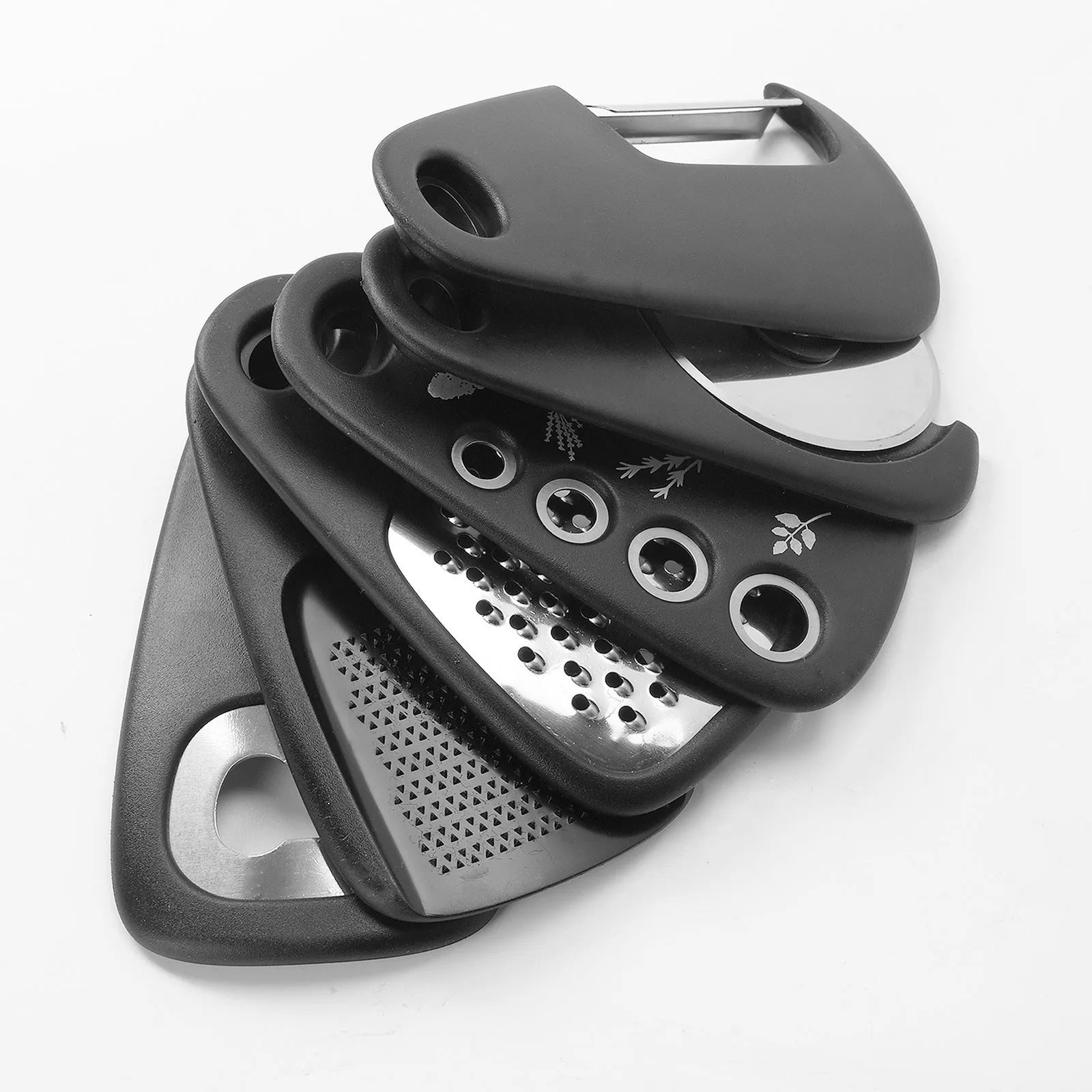 Six stainless steel kitchen gadgets stacked together in modern colour box with cleaning brush