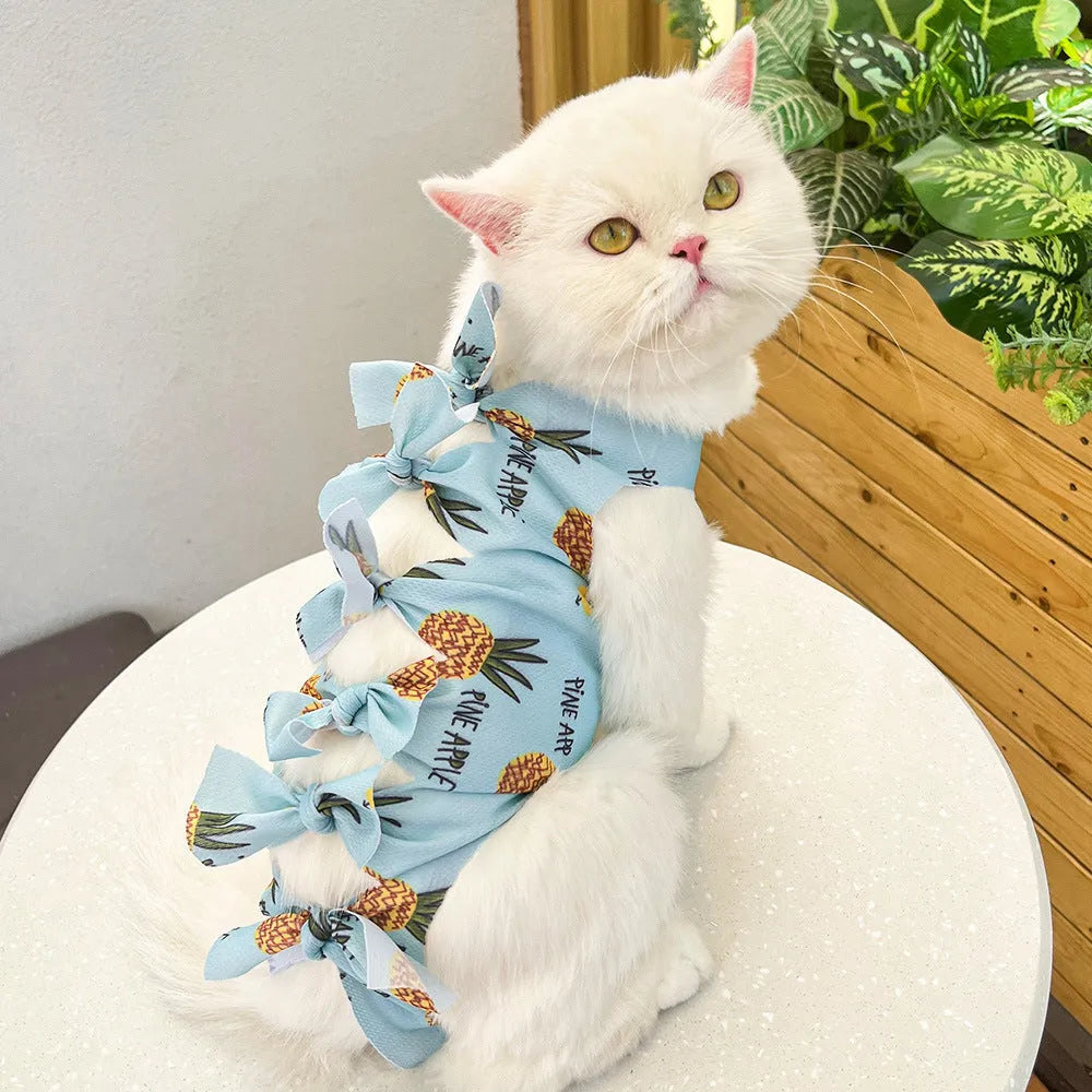 Adjustable lace-up cat sterilisation recovery suit in polyester, shown in various colours.