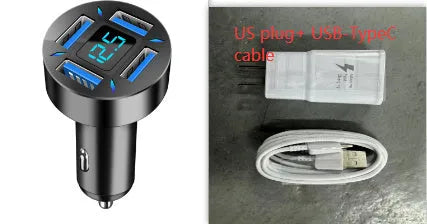 Black four-port USB car charger with digital LED display, shown plugged into a car dashboard.
