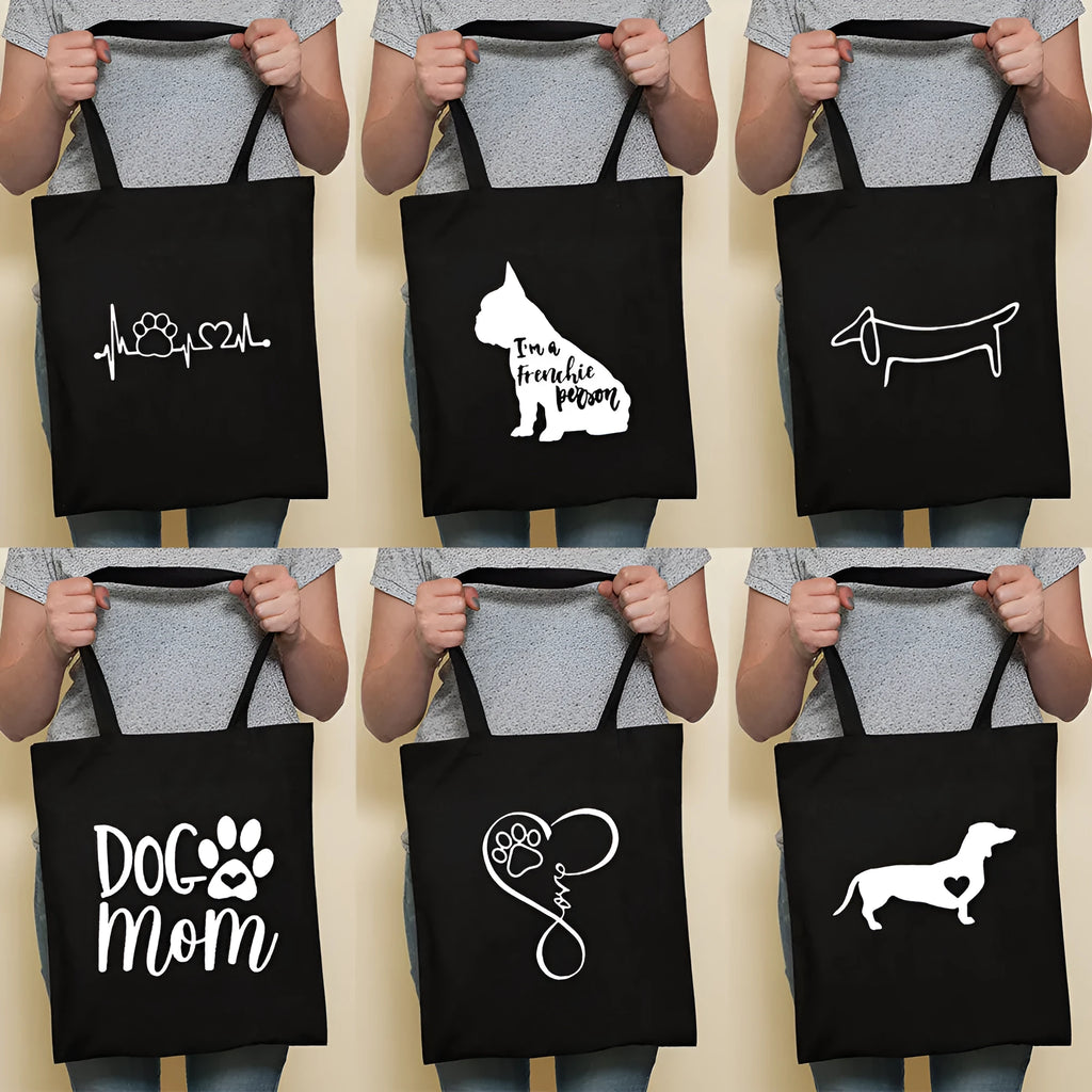 Sausage dog printed canvas bag in black with white dog design on front, sturdy tote for everyday use