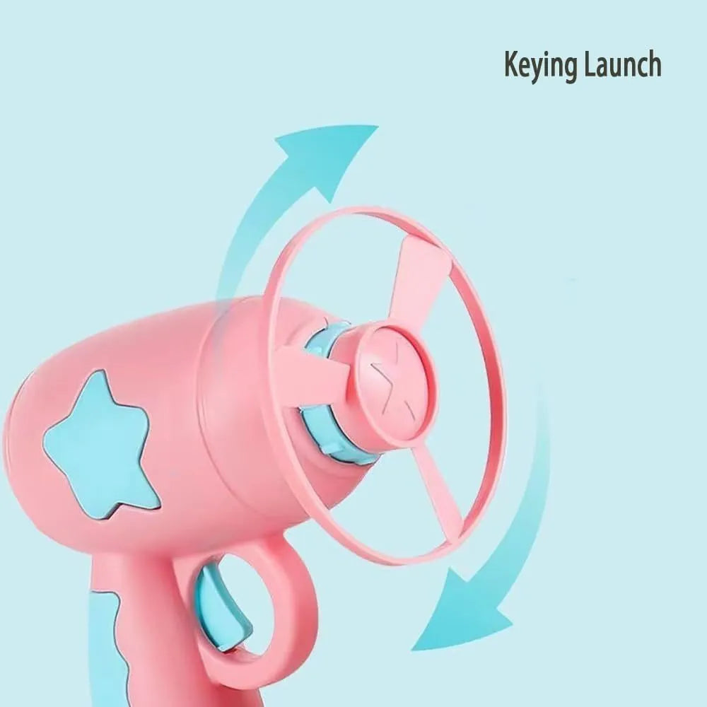 Blue interactive cat toy gun with plastic frisbee mounted ready for launching