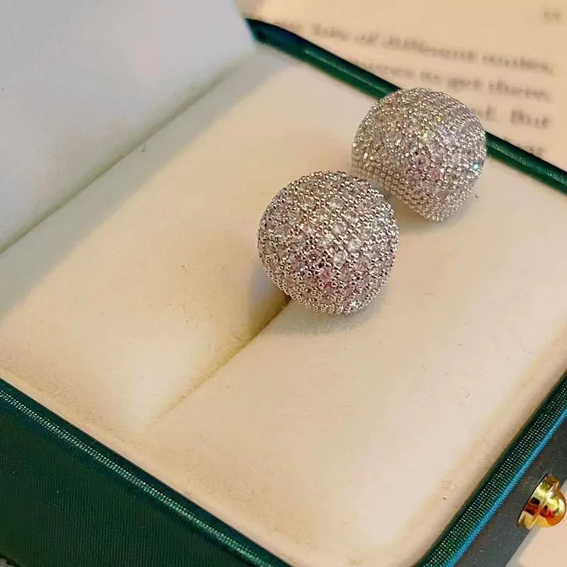 Geometric drop ear clips with diamond-cut golden beans in gold or white colour