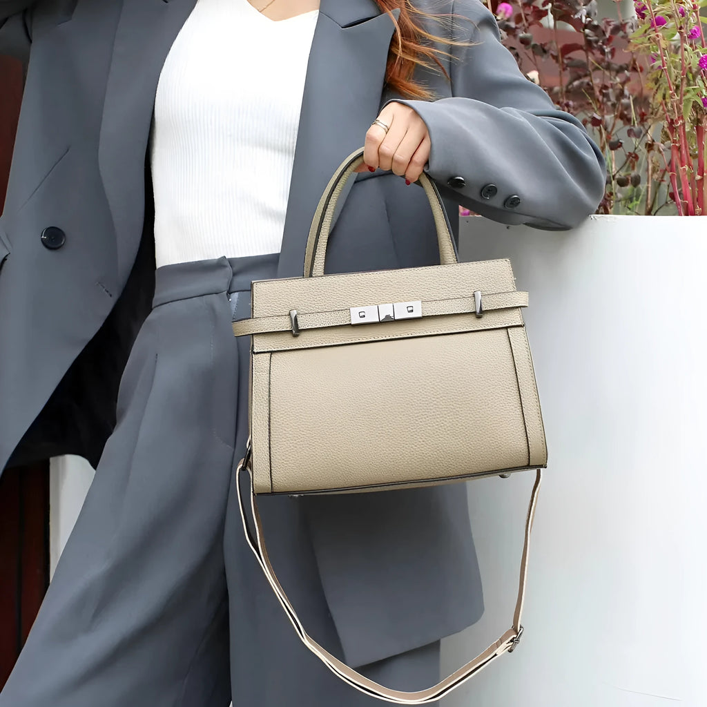 Small square genuine leather shoulder bag in horizontal design with organised interior compartments