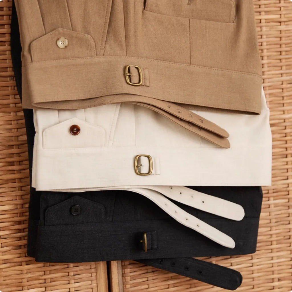 Men's slim fit straight leg trousers in dark grey, light brown, or light apricot, made from wrinkle-resistant polyester fabric.