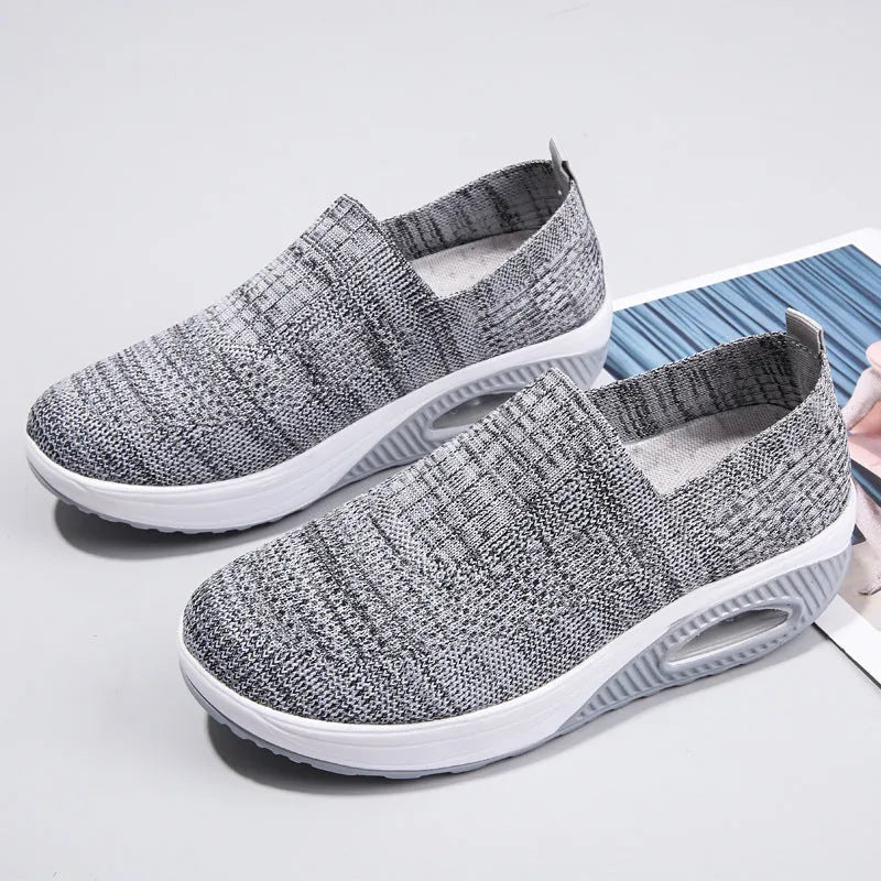 Women's mesh running shoes with air cushion technology in multiple colour options