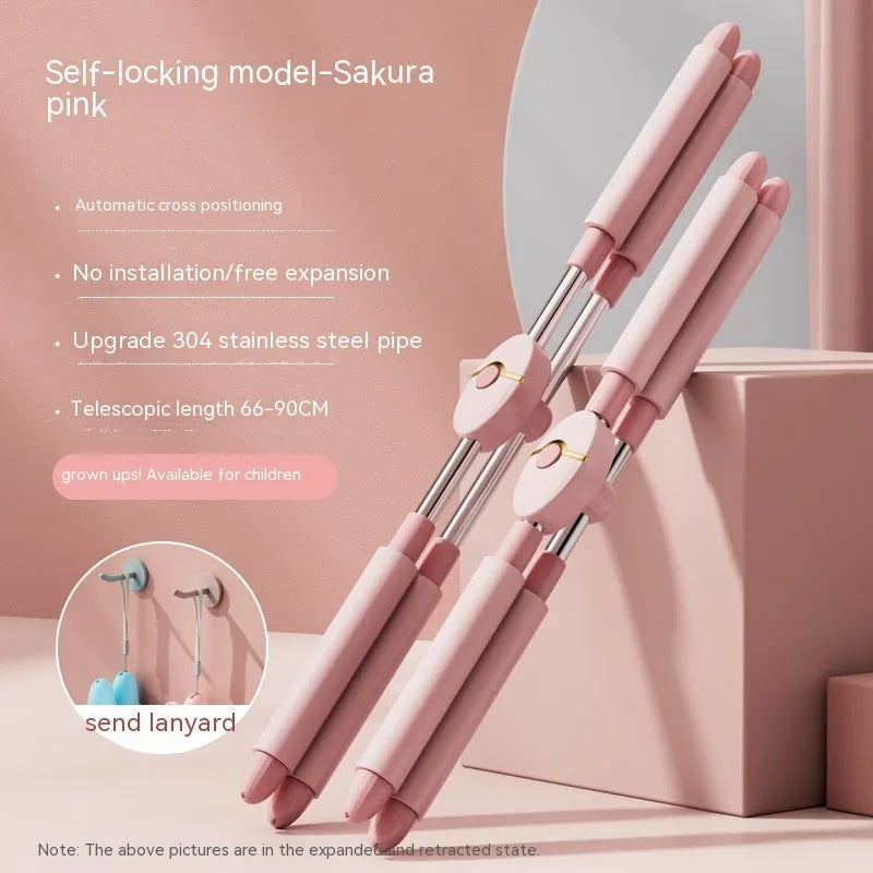 Children's adjustable open back stick in pink colour showing length adjustment mechanism