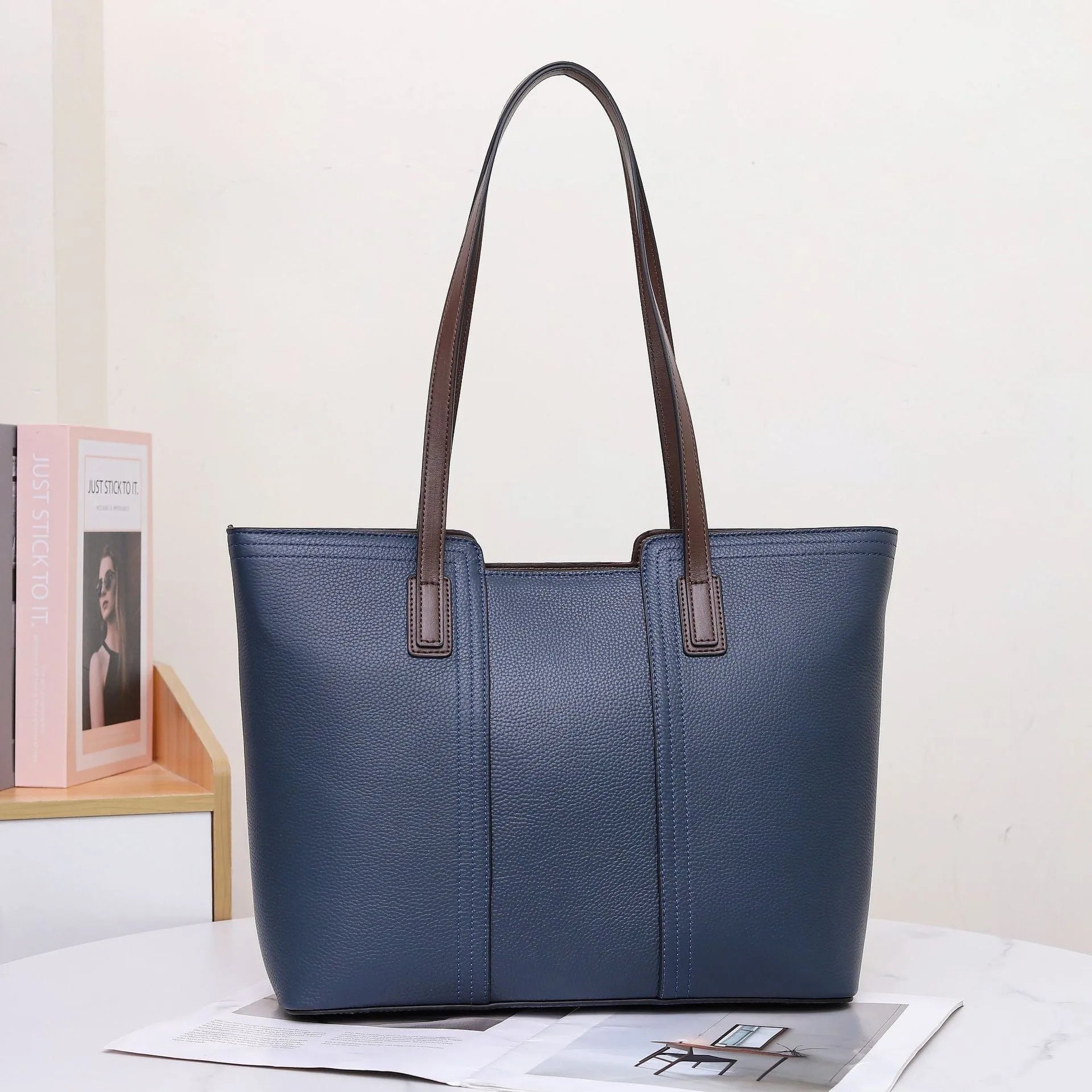Women's genuine leather commuter shoulder bag in khaki colour with sandwich pocket and internal organisation