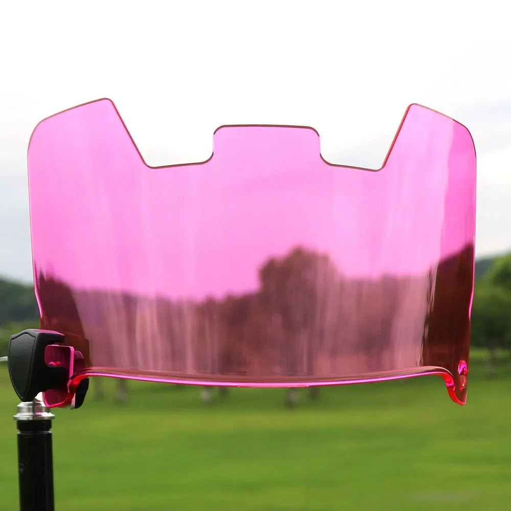 Close-up of multicolour rugby helmet goggles showing impact-resistant material and attachment points.