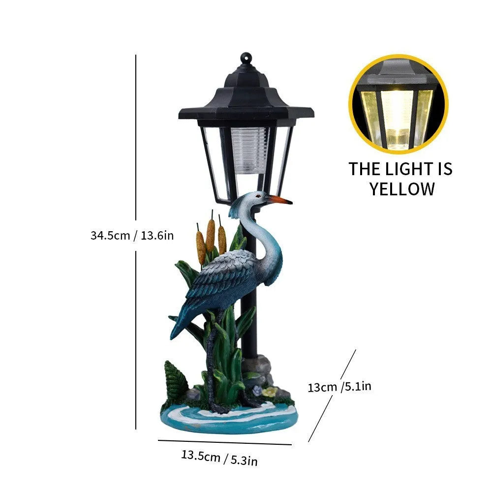 Solar hexagonal garden lamp with decorative resin figurine on plastic base for outdoor pathway lighting