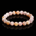 3A natural cherry agate bracelet with round polished beads in sweet style for women