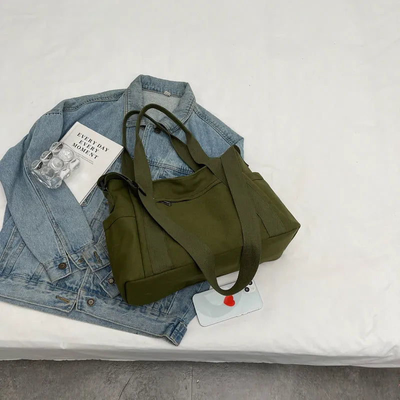 Large capacity shoulder canvas tote bag in solid colour with sandwich pocket and mobile phone compartment