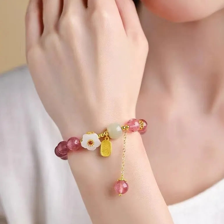 Handmade strawberry quartz crystal bracelet for women showing five natural stone design variations