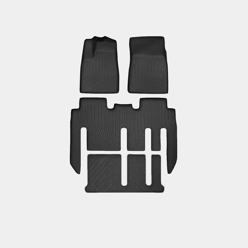 Rubber floor mat set for Tesla Model X showing foot pads and tailbox cushion for interior protection