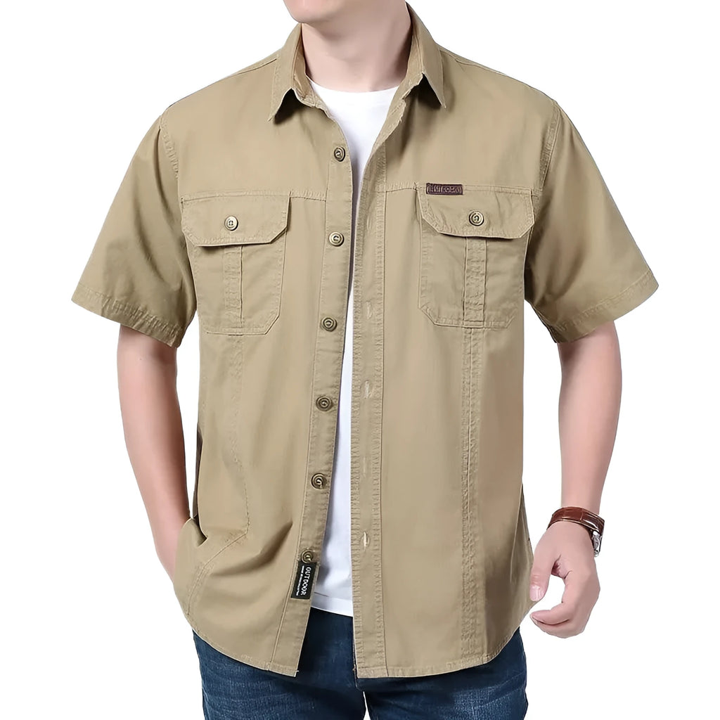 Men's cotton short sleeve loose fit cardigan shirt in dark blue on a model, summer workwear style