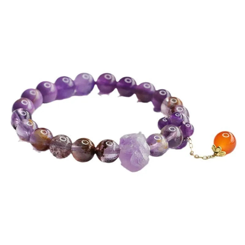 Purple amethyst crystal bracelet with red agate stones measuring 8mm beads