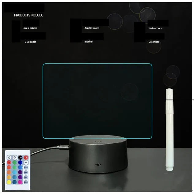 Black 3D LED handwritten acrylic message board with remote control on a desk.