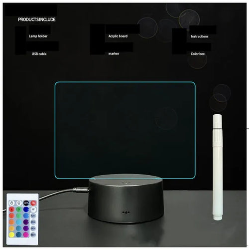 Black 3D LED handwritten acrylic message board with remote control on a desk.