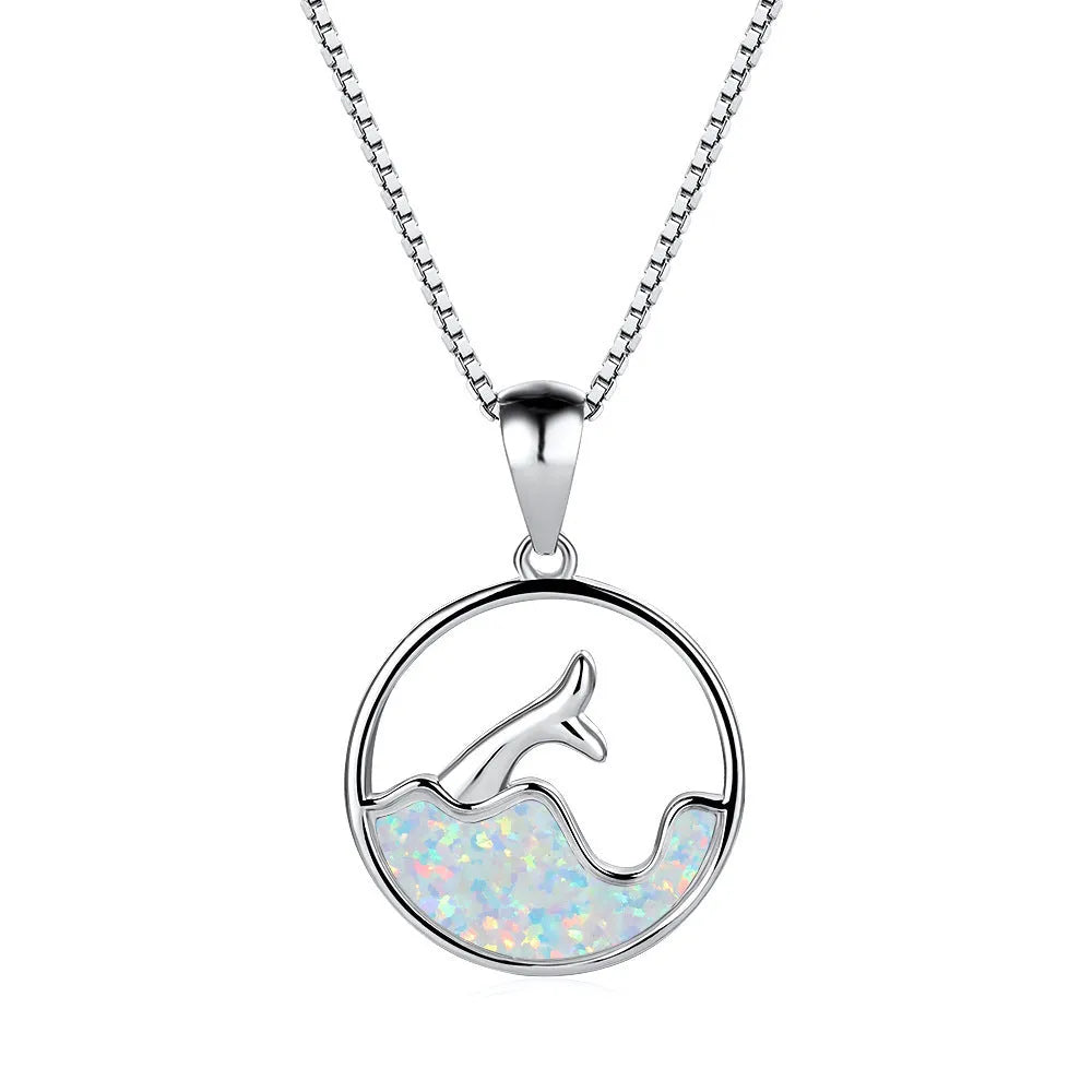 Geometric round fishtail pendant necklace with a blue opal stone on a chain, showing white gold electroplated finish.