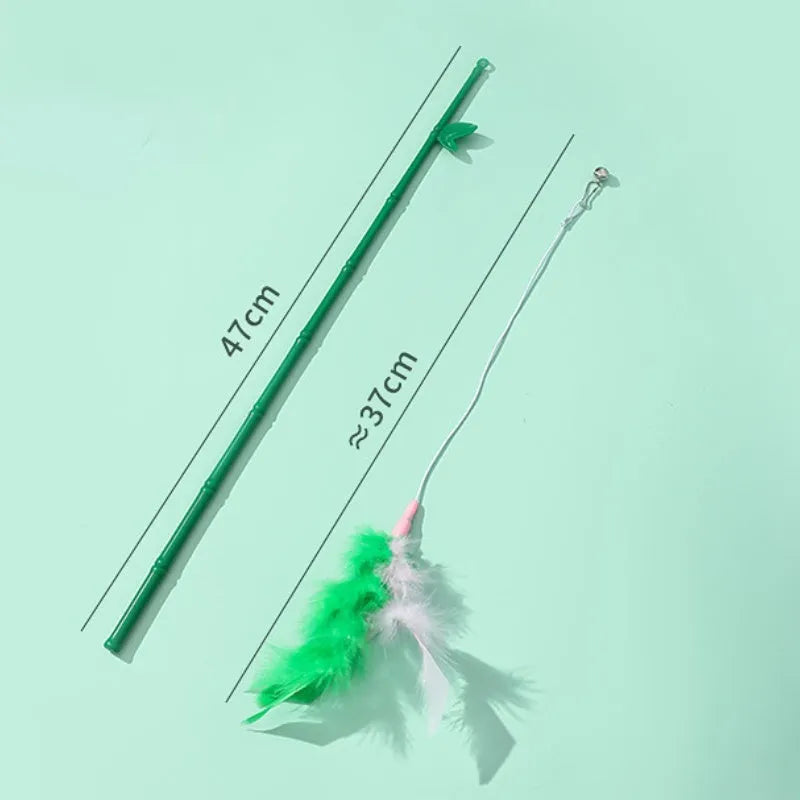 Green interactive cat feather wand toy with bell attachments for feline exercise and training