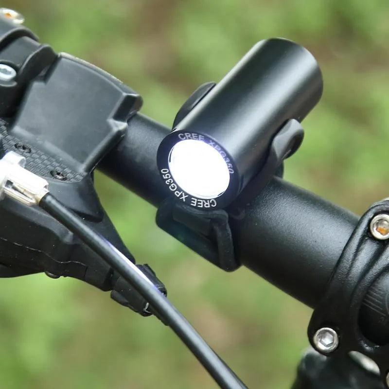 Black USB rechargeable 350 lumen bicycle front light on handlebars