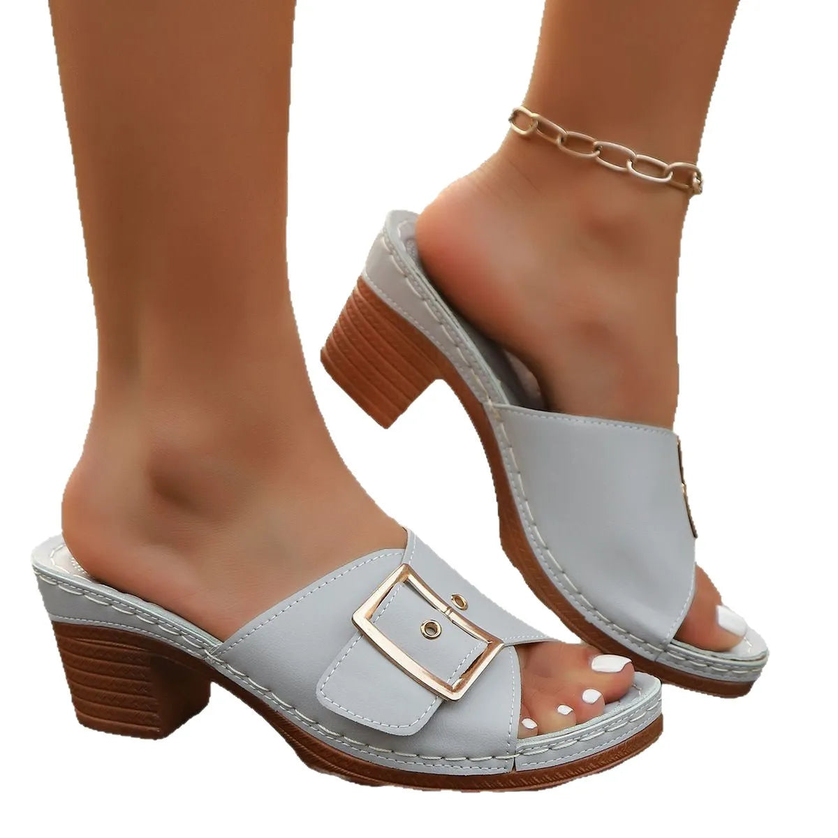 Women's retro chunky heel slippers with a metal buckle in black and light blue colours.