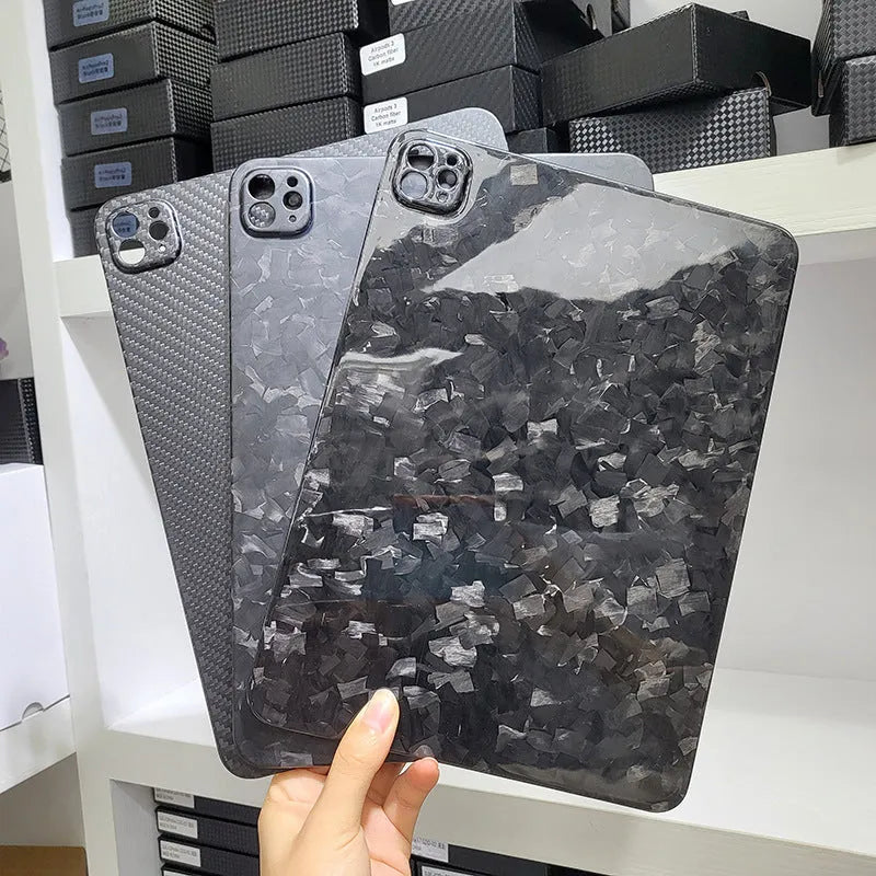 Carbon fibre hard case for Apple iPad Pro 11 with embossed plaid pattern showing three surface finish options