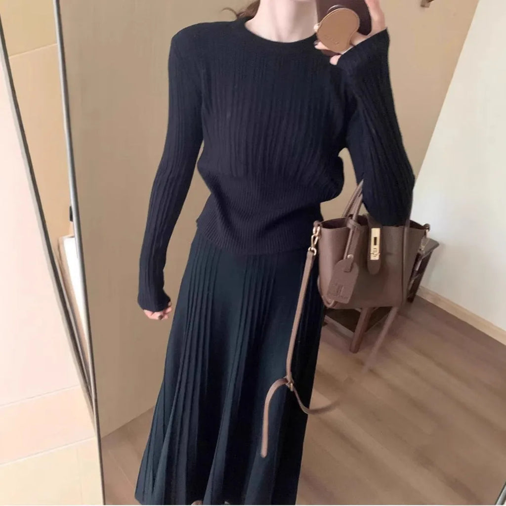 Knitted dress suit set with 3D pattern ethnic style showing sweater and skirt coordination in dark grey colour