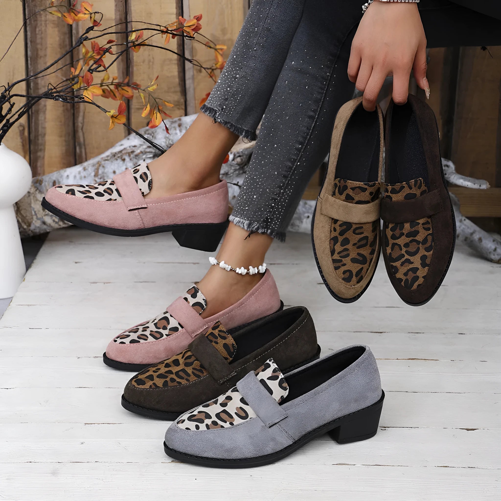 Leopard print slip-on suede pumps with pointed toe and chunky rubber sole in pink colour
