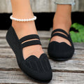 Women's casual mesh slip-on flats in black with round toe, flat heel, and breathable upper