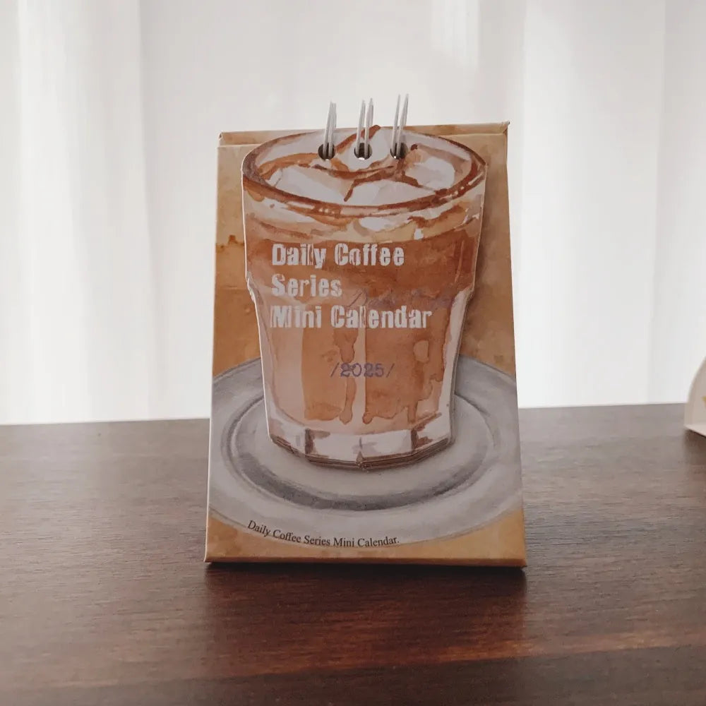 Coffee themed mini desk calendar 2025 with ten different daily designs including Coffee Time and Life Is Not Easy