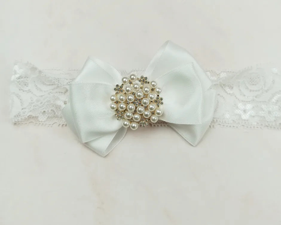 Milky white handmade soft sole cloth princess shoes with pearl detailing and lace-up closure for babies