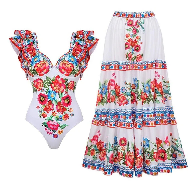 Women's printed polyester one-piece swimsuit on a hanger.