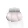 Paw Soft deshedding brush grooming tool for cats and dogs on a white surface.
