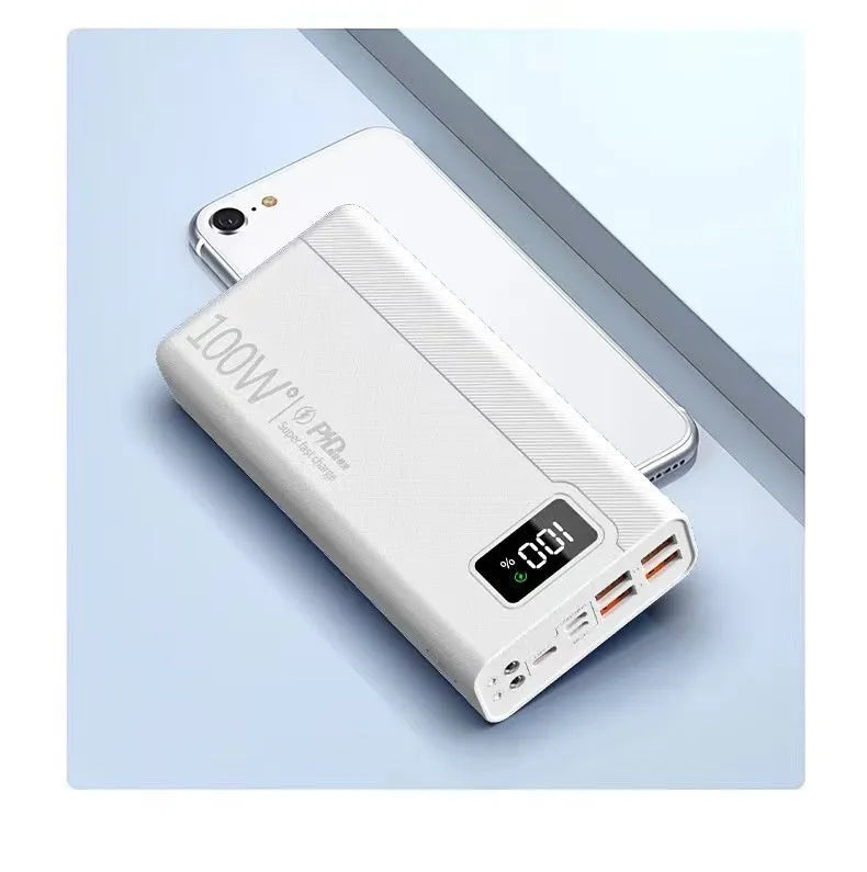 Large capacity power bank in black or white with plastic shell and multiple charging capacity options