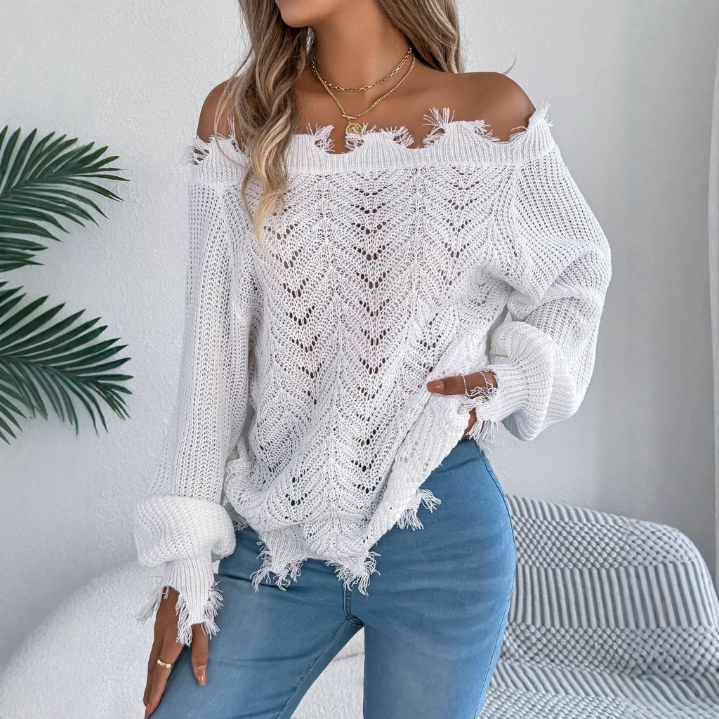 Women's white hollow-out pullover sweater with cut off-the-shoulder design and long sleeves