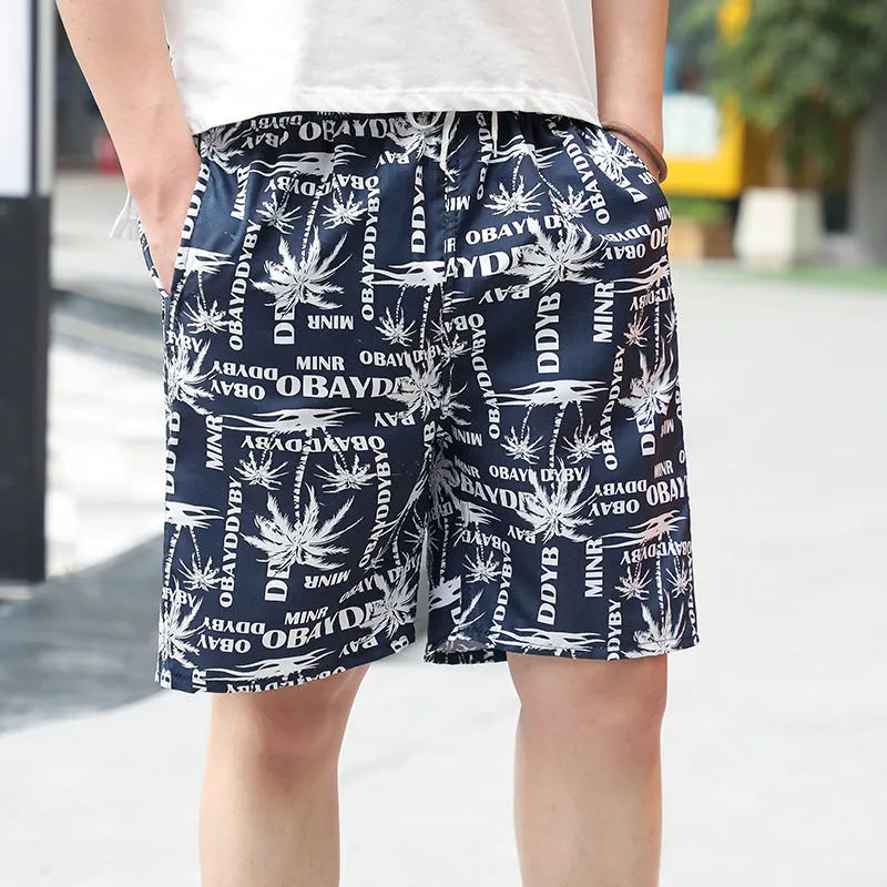 Men's floral print swimming trunks in polyester with five-point design