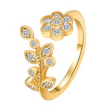 Open mouth copper ring with flower and leaf design in a gold finish