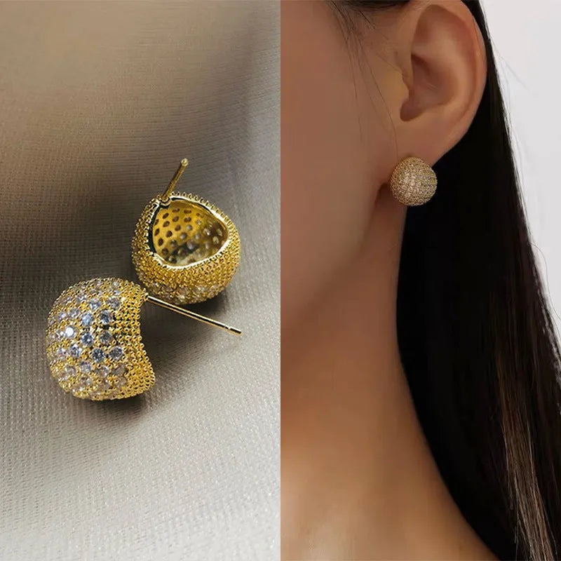 Geometric drop ear clips with diamond-cut golden beans in gold or white colour